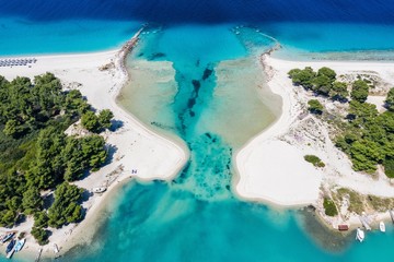 Aerial drone view of Port Glarokavos and lagoon beach in Kassandra penisula Chalkidiki Greece