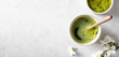 matcha green tea on a light background, top view, place for text, banner