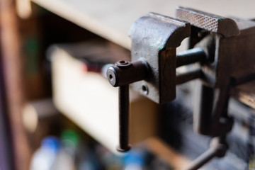 the machine is a metal press for fastening parts in the workshop