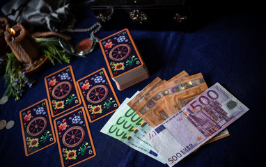  Magic for attracting money, rituals and fate prediction, details on a table of witch, occultism concept