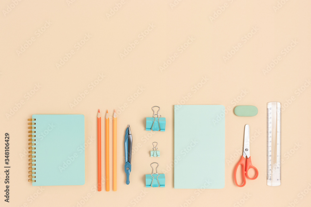 Layout of various stationery on a beige background. Back to school ...