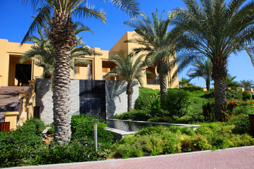 Beautiful hotel complex on the beach. Front view. Empty resort is closed for quarantine. Buildings in the Arabic style.