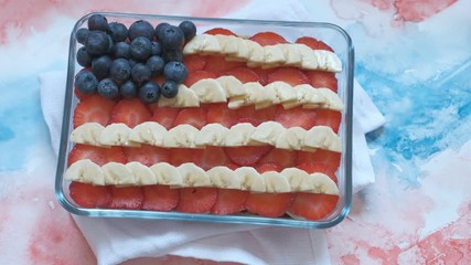 Wall Mural - Patriotic American flag fruit berry dessert with banana, blueberries and strawberries