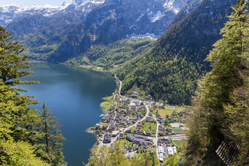 aerial views of the lake-side town of Hallstatt and great mountains in Austrian Tyrol