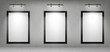 © klyaksun - Blank movie posters illuminated by spotlights. Vector realistic mockup of white picture in black frames on gray tiled wall in cinema, theater hallway or gallery. Empty advertising banners with lamps