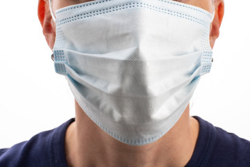 man face closed protective medical blue mask on a white background