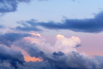 Wall Mural - clouds in the sky background dramatic light, before the rain. Space for text