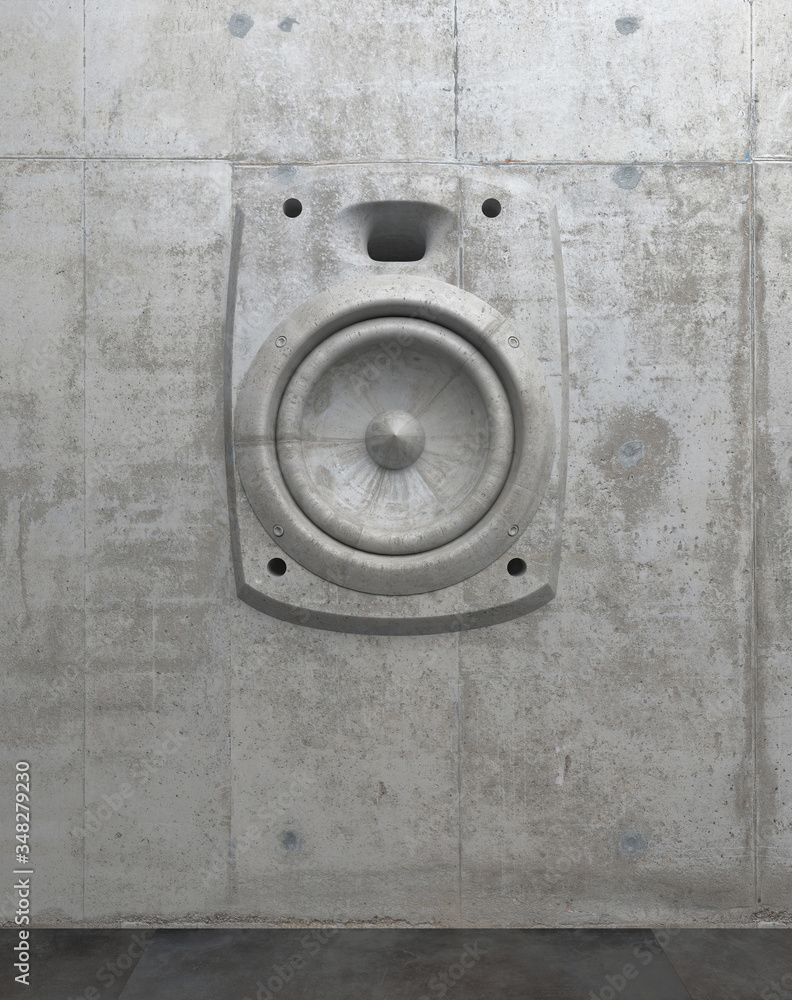 Cement sculpture in the shape of a sound speaker on a concrete facade ...