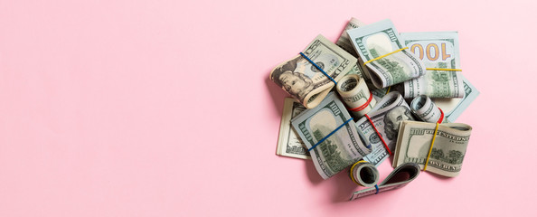 US Dollar bills bundles stack. one hundred dollar bills with stack of money in the middle. Top view of business concept on background with copy space