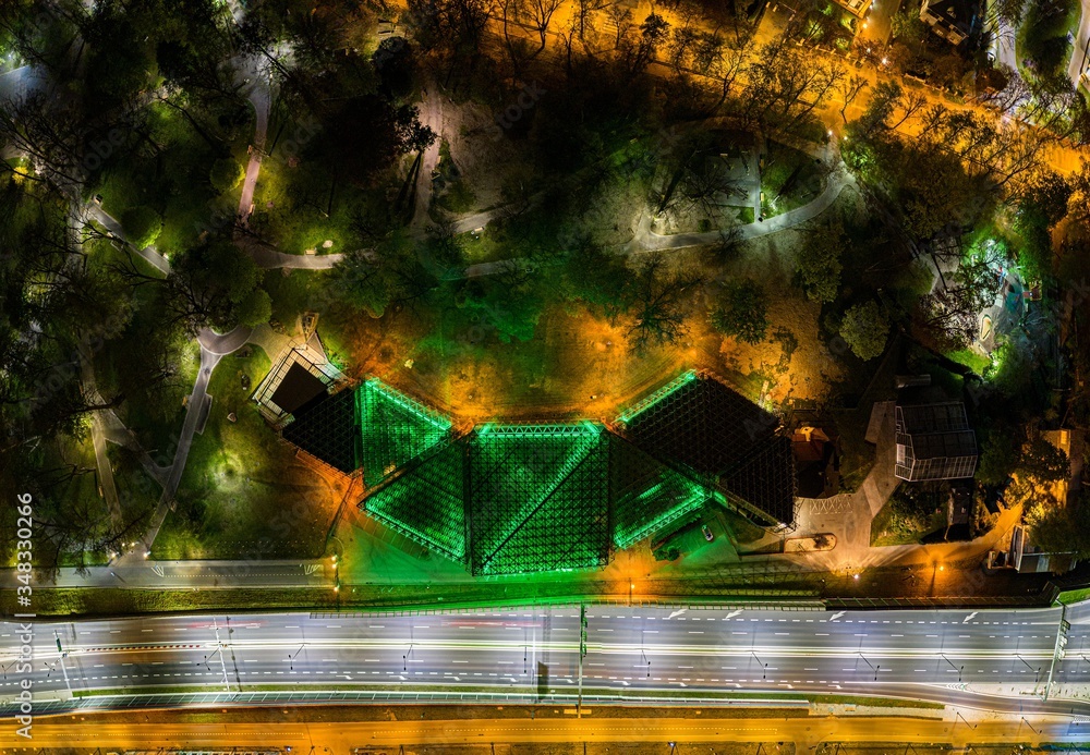 Obraz na płótnie Aerial drone view on palm house in Gliwice at night w salonie