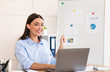 © Prostock-studio - Businesswoman Making Video Call Having Online Conference Sitting In Office