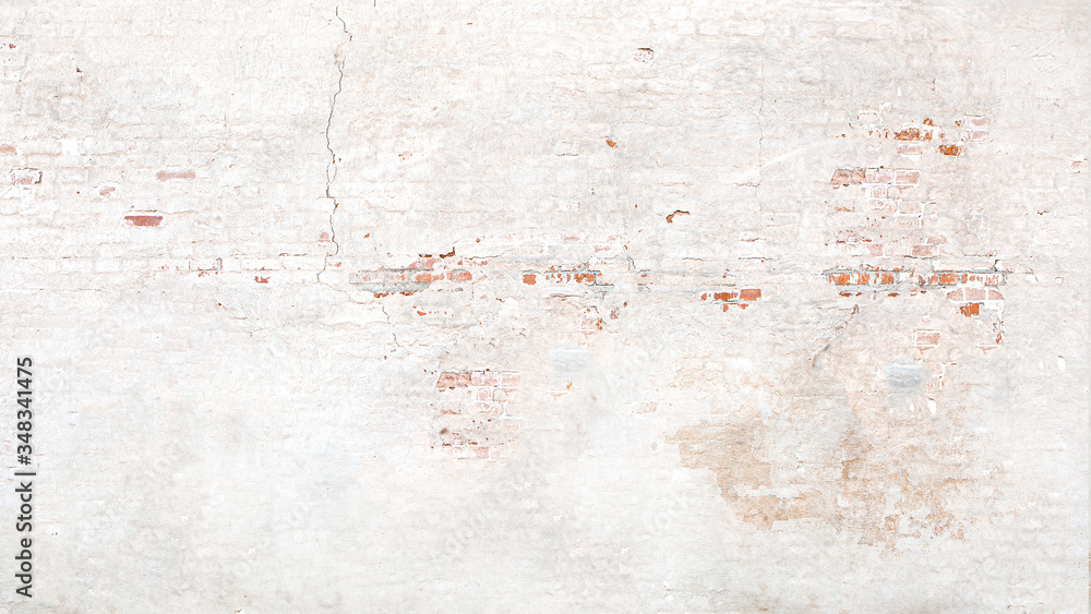 Photo Brick wall texture with white shabby stucco, plaster