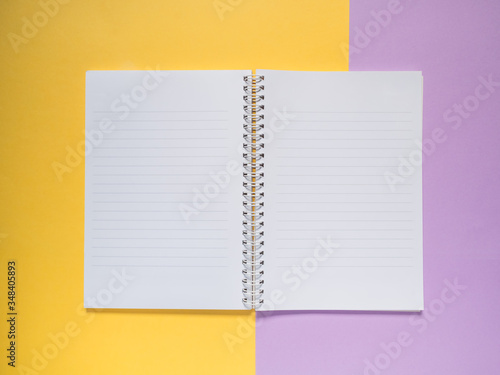 Notebook on a color background, Notebook on color paper © touch_of_eyes