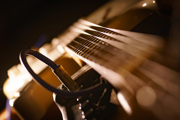 close up of electric guitar detail depth of field