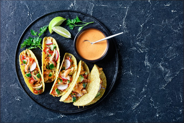 Wall Mural - Buffalo Chicken Corn Taco shells, flat lay