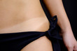 detail of model`s body before and after applying airbrush tan treatment in beauty salon. fake tan on woman`s body. Eko tanning. Ecological tan.