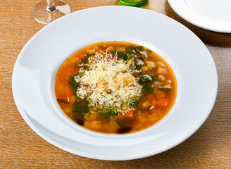 Wall Mural - Minestrone is a thick soup of Italian origin made with vegetables, pasta and rice