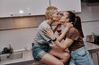 © jen2215 - Two girls chatting with each other in the kitchen, love relationship same-sex couple girls. Family and family relationships.