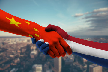 Shaking hands China and Netherlands