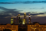 Fototapeta  - Moscow city view at midnight; shining skyscrapers in front of night sky