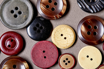 Poster - Background and texture of multicolored antique buttons