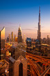 The view of the futuristic Dubai skyline and Sheikh Zaed road at dusk, UAE.