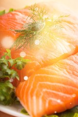 Sticker - Fresh salmon steaks with parsley on white plate