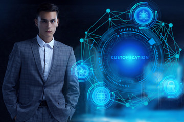 Business, Technology, Internet and network concept. Young businessman working on a virtual screen of the future and sees the inscription: Customization