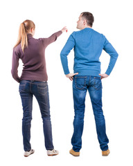 Canvas Print - Back view of couple in sweater pointing.