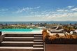 © Paul Bradbury/Caia Image - Sunny, modern rooftop swimming pool with ocean view, Cape Town, South Africa