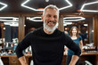 © Svitlana - Perfect beard. Portrait of elegant and happy bearded man looking at camera and smiling while visiting barber shop or salon