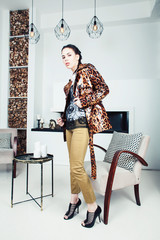 Wall Mural - pretty stylish woman in fashion dress with leopard print in luxury house interior, lifestyle people concept