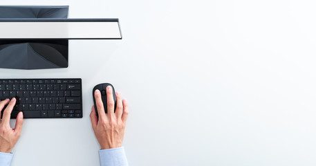 Aufkleber - Top view of computer with blank display. Businessman clicking mouse on white background.