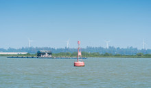The Floating Sign Of A Red Buoy  Nchored To Indicate Navigational Hazards Along The Way Of Ships Or To Protect The Fairways