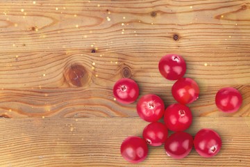 Canvas Print - Fresh ripe red cranberry on desk