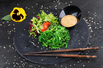 Wall Mural - Japanese Cuisine - Chuka Seaweed Salad. Served with Nuts Sauce and Sesame