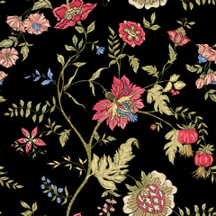 Wall Mural - Seamless pattern with stylized ornamental flowers in retro, vintage style. Jacobin embroidery imitation. Colored vector illustration on black background.