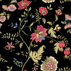 Canvas Print - Seamless pattern with stylized ornamental flowers in retro, vintage style. Jacobin embroidery imitation. Colored vector illustration on black background.