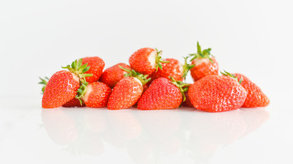 fresh strawberries bright red new crop on a white background