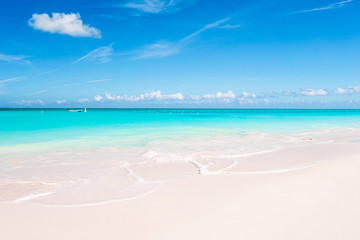 Wall Mural - Idyllic tropical beach in Caribbean with white sand, turquoise ocean water and blue sky