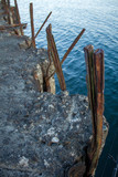 Fototapeta Morze - old concrete pier on the island