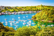 Boats In The Harbour Of Fowey In Cornwall, UK