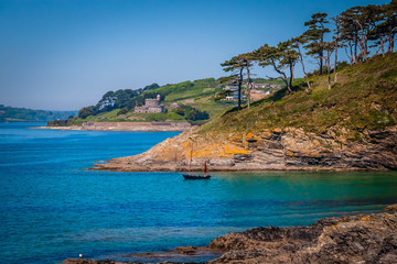 Green coastline at the Roseland Heritage Coast in Cornwall, UK