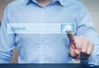 Fototapete - Businessman clicking internet search page on computer touch screen. Concept Searching new job. Copy space.