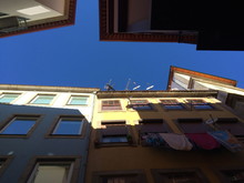 Low Angle View Of Buildings Against Clear Blue Sky
