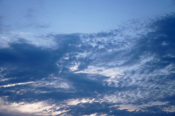 Wall Mural - beautiful sky on a blue background with an airplane window. white clouds of various shapes. stock ba