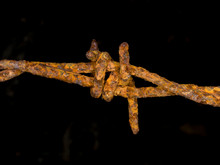 Close-up Of Rusty Barbed Wire
