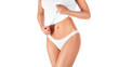 © Stavros - Slim tanned woman's body. Woman showing her waist. Isolated over white background.