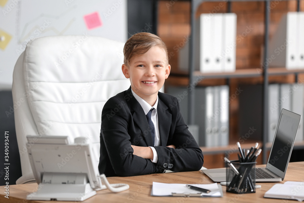 Little secretary working in office