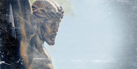 Fototapete - Retro styled statue of the crucifixion of Jesus Christ in profile. Horizontal image.